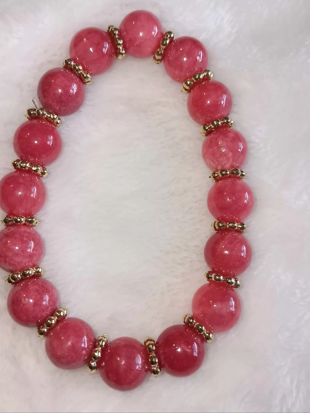 Coral Stretch With Silver Spacers.